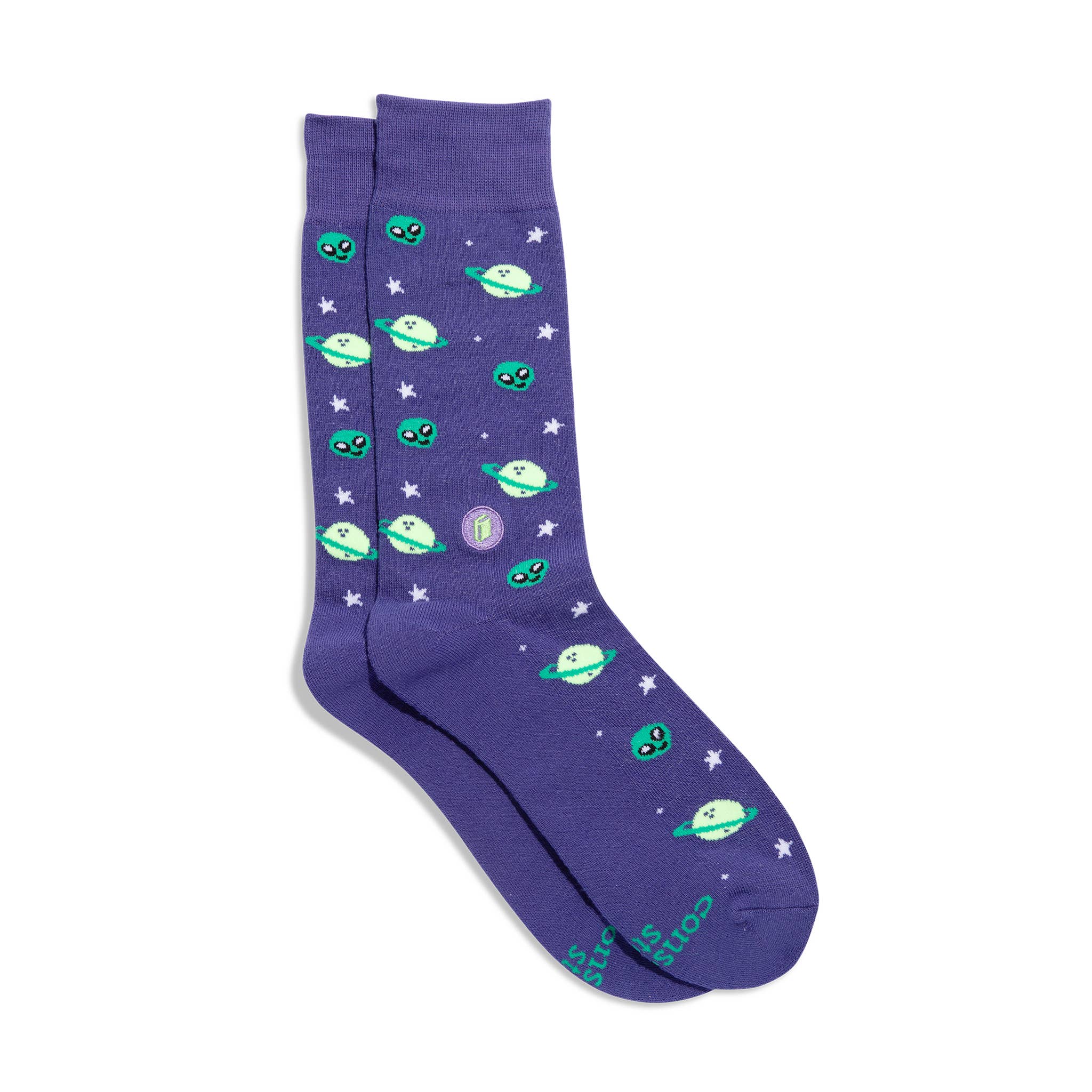 Purple socks with green alien and spaceship pattern on a white background