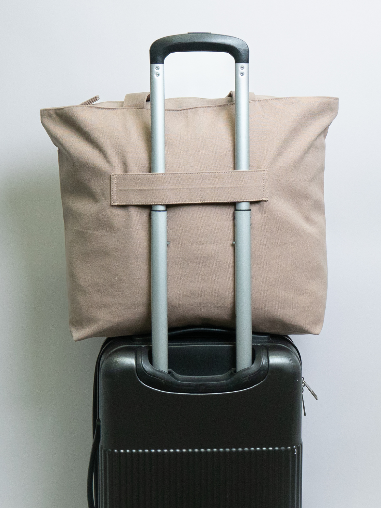 Tote bags with trolley sleeve