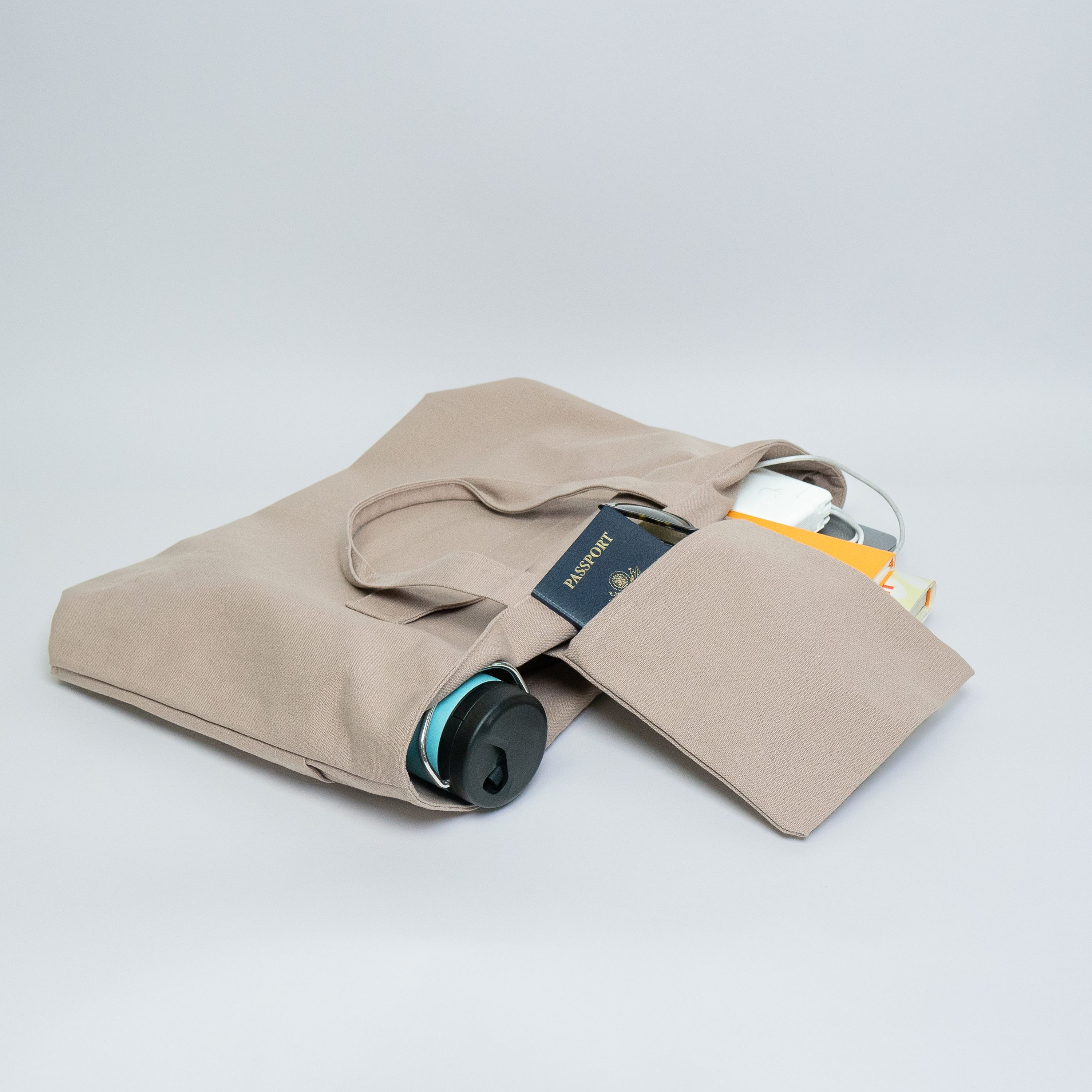 Tote bags with trolley sleeve