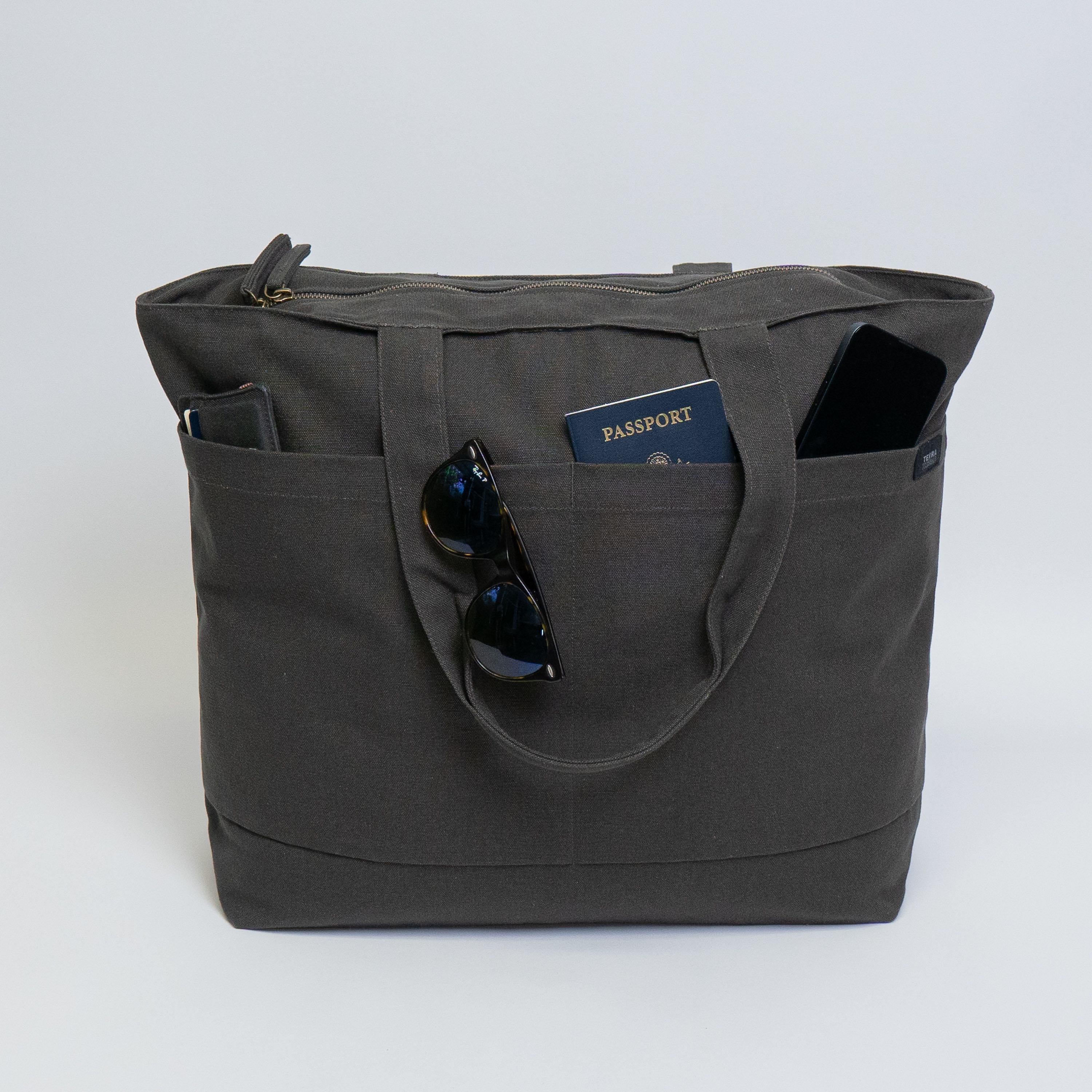 Tote bags with trolley sleeve