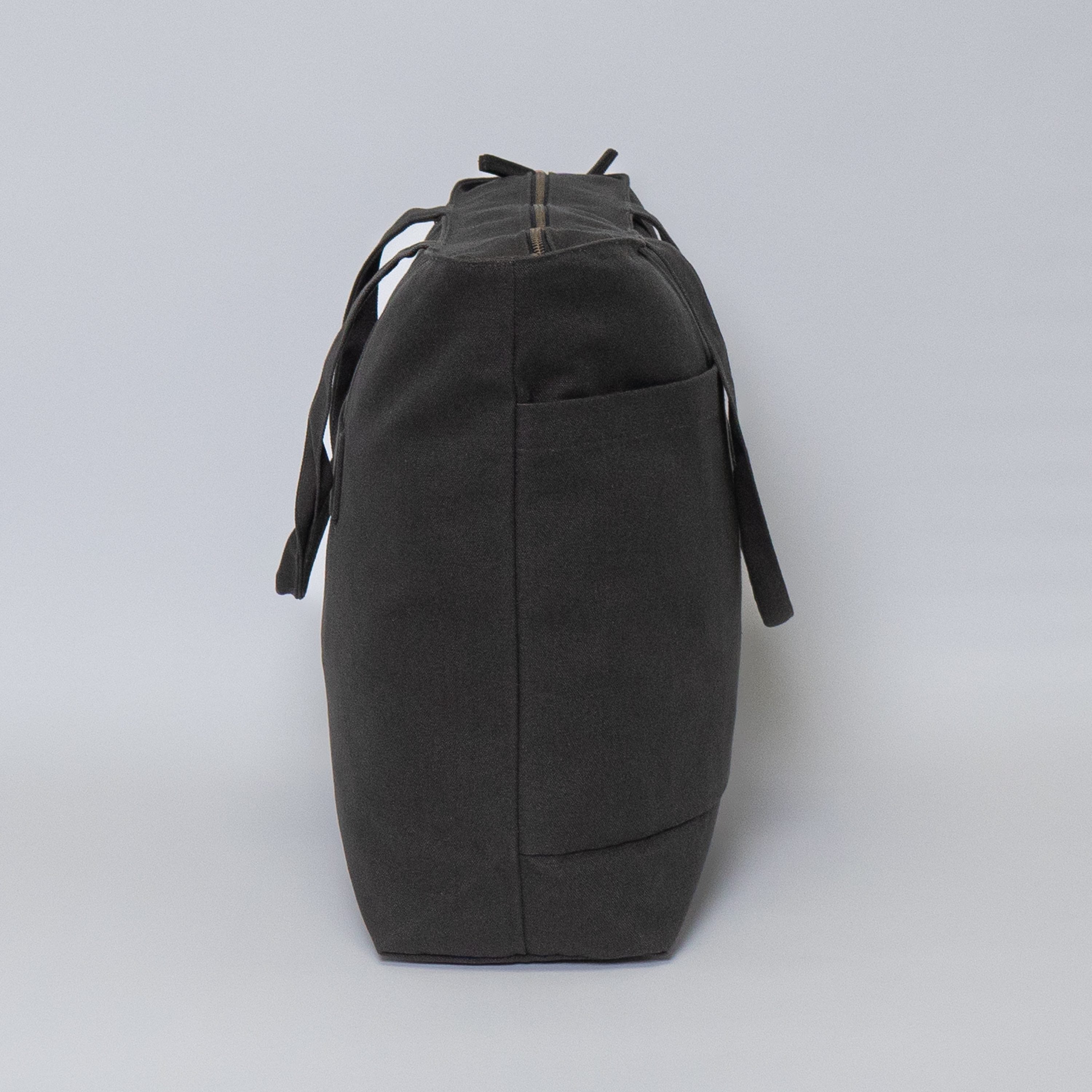 Tote bags with trolley sleeve