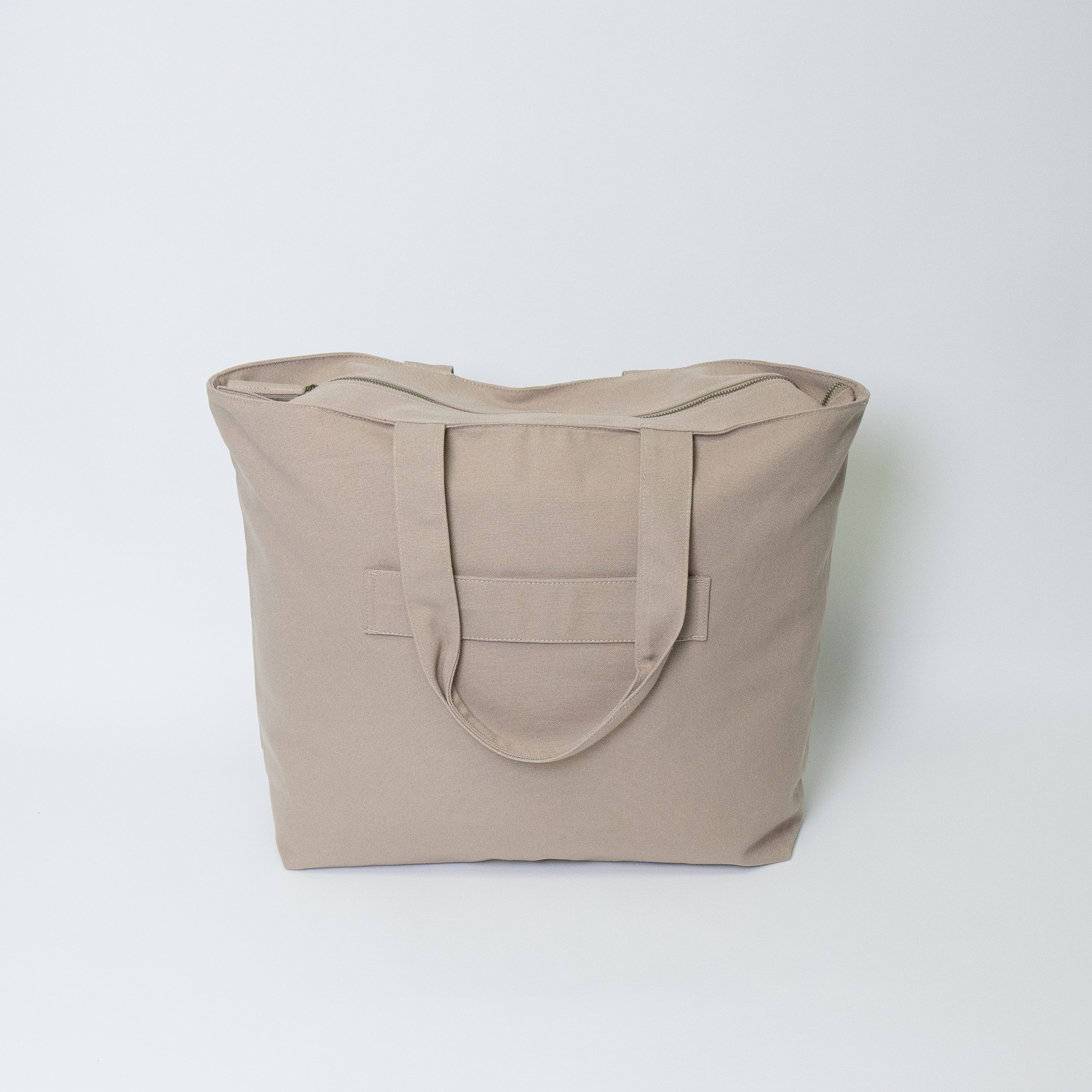 Tote bags with trolley sleeve
