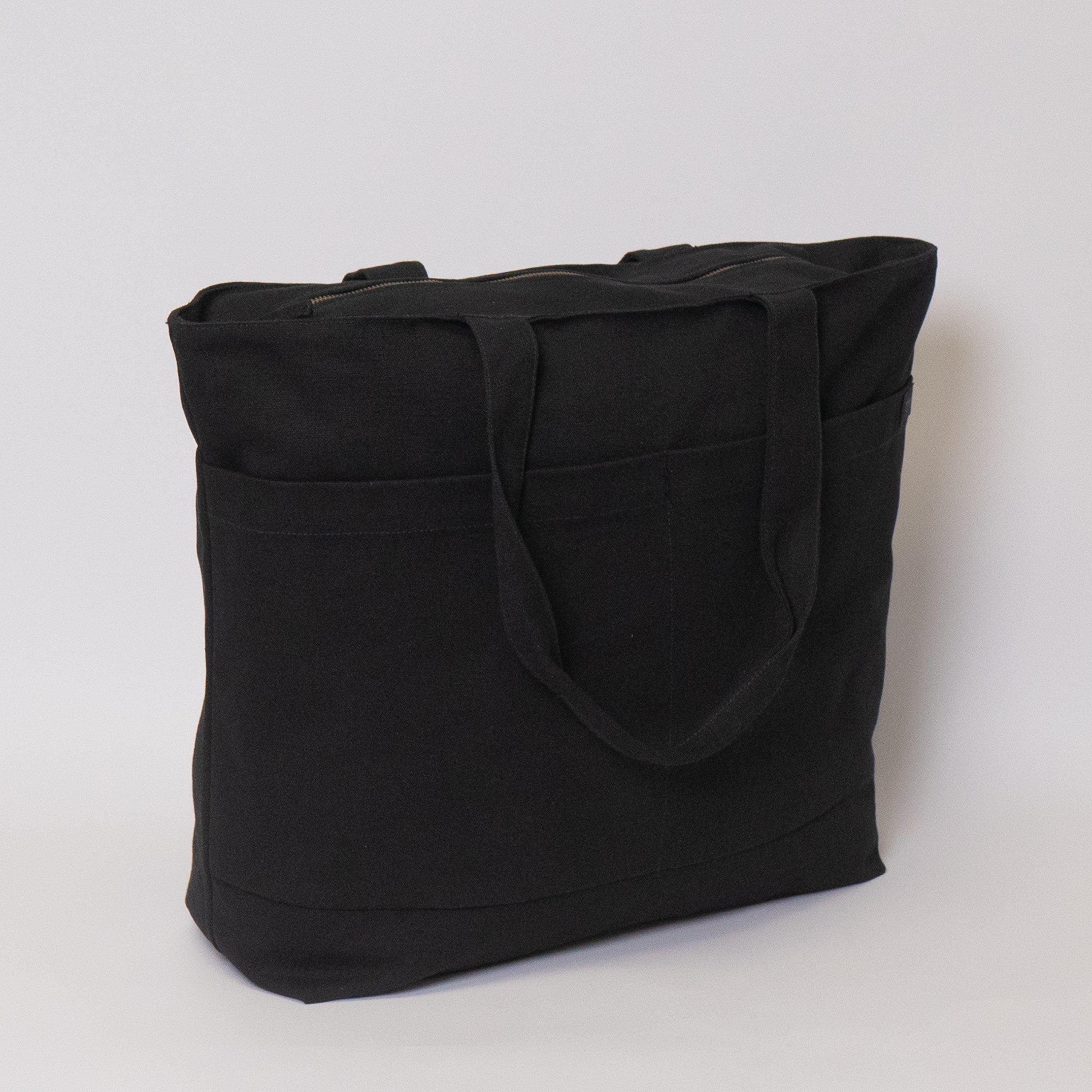 Tote bags with trolley sleeve