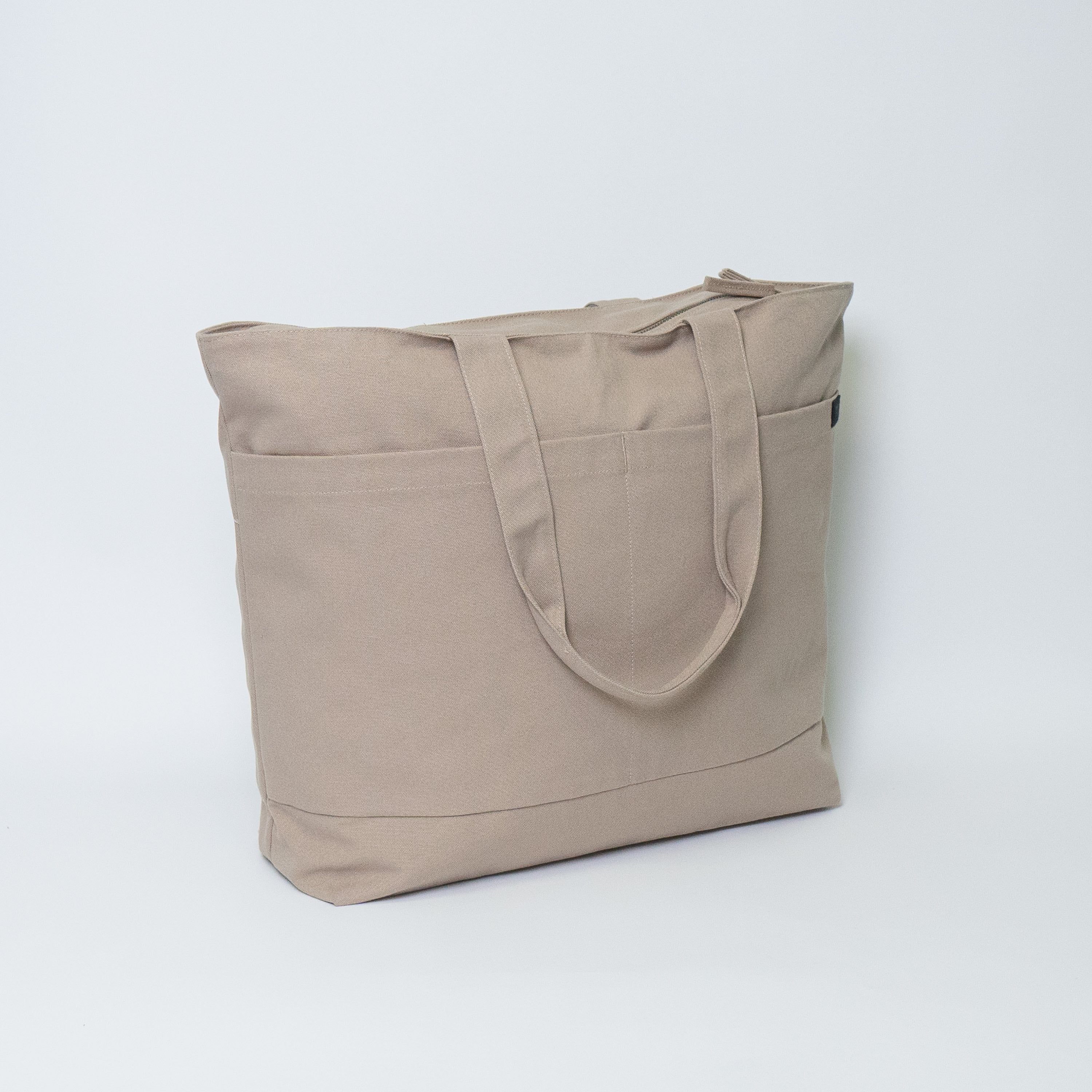Tote bags with trolley sleeve