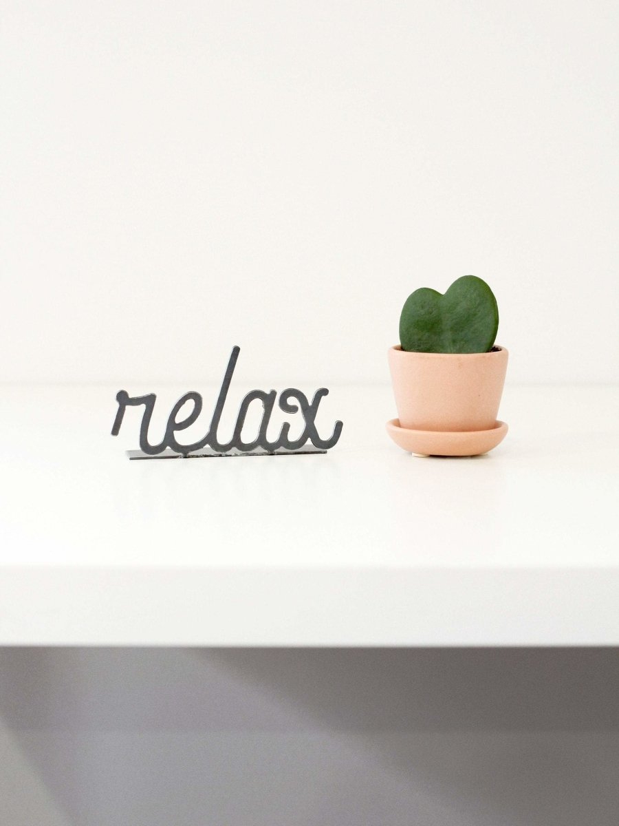 Relax Word Sign